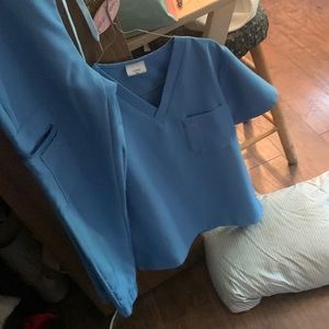 3 scrub sets black light blue navy blue xsmall Lunda brand $90 for all or $30